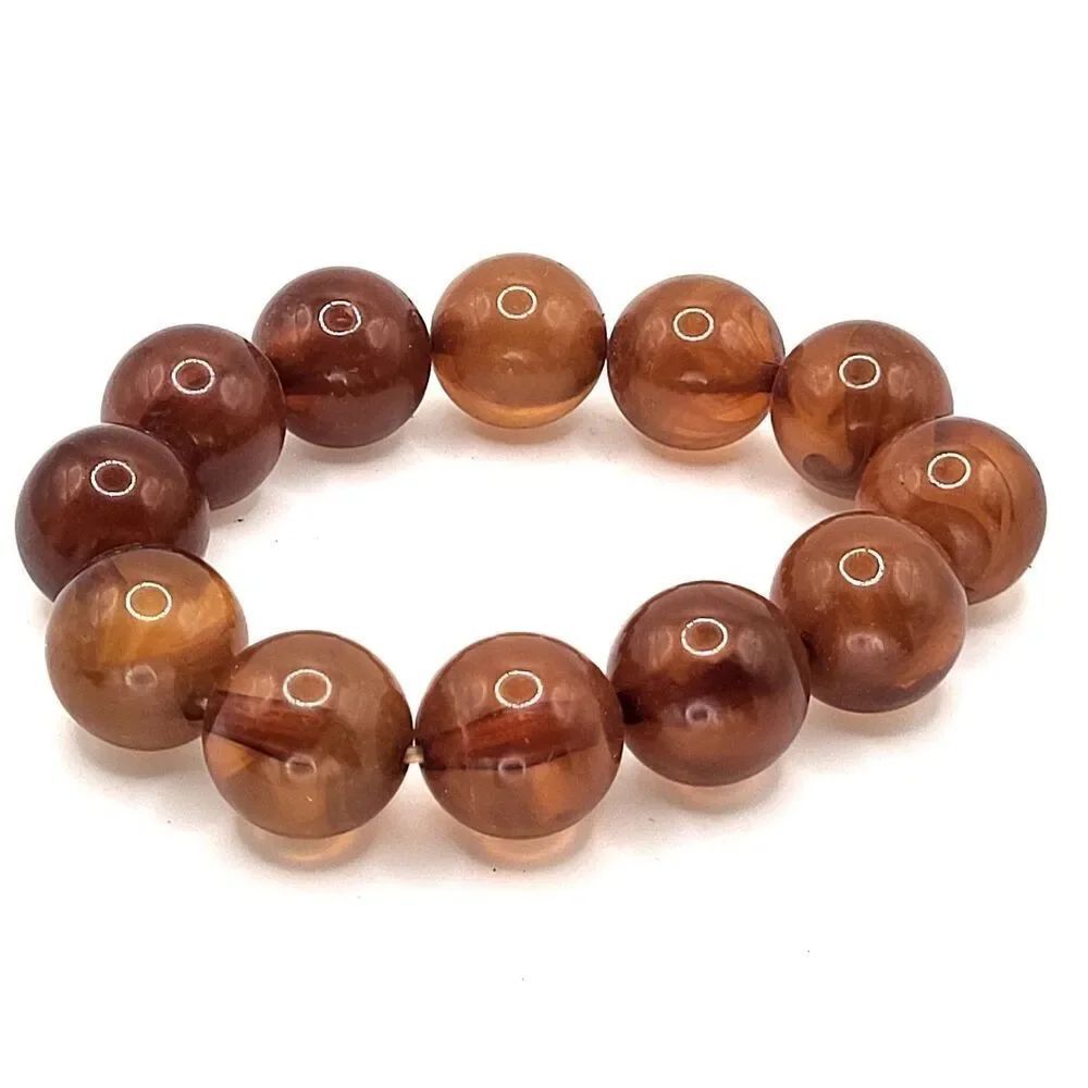 Vintage 70sโAmber or Carnelian Colored Acrylic Beaded Stretch Bracelet 7in